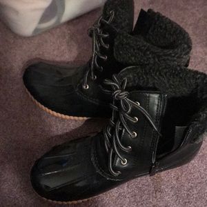 Never worn. Too small for me, size 6 1/2